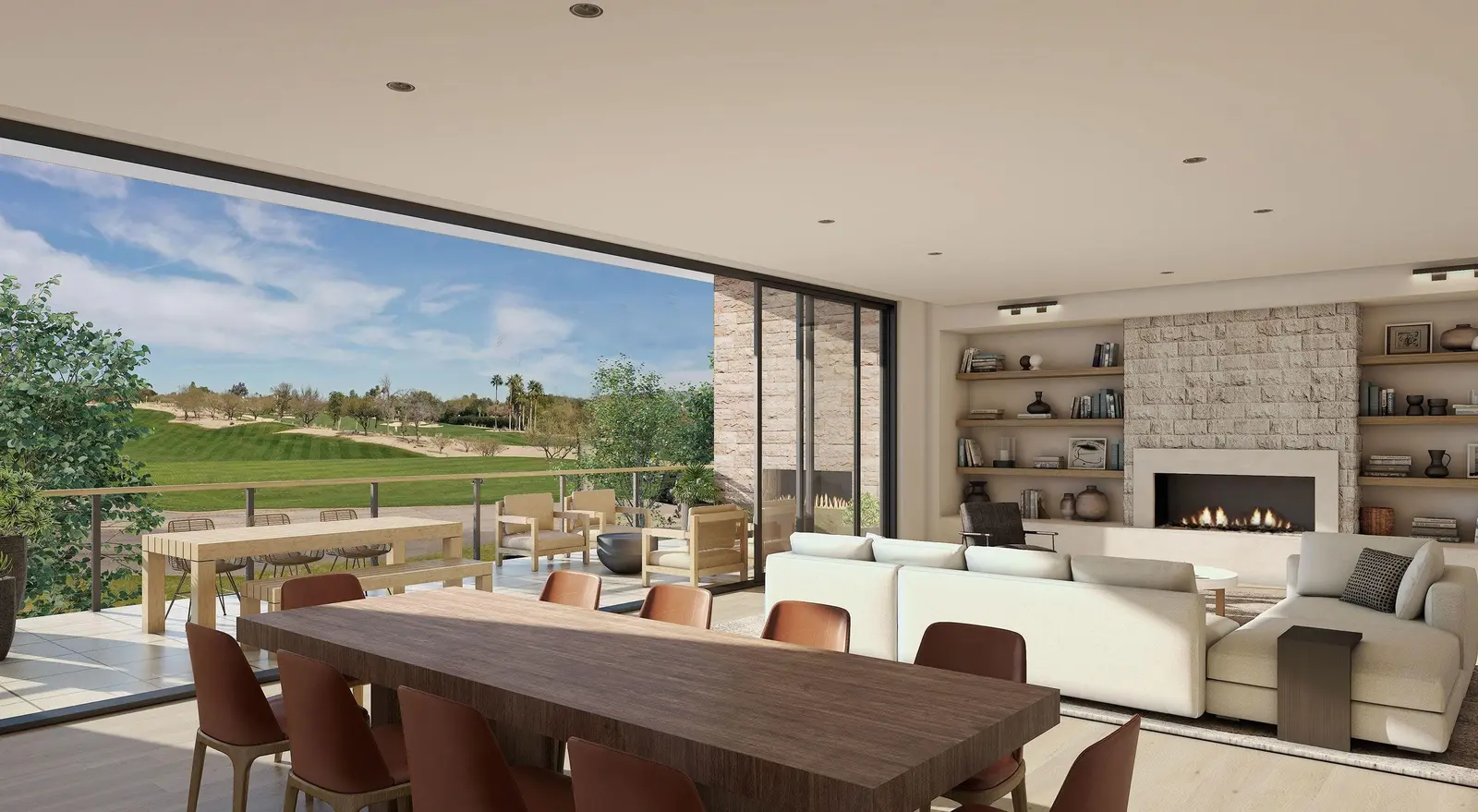 Great room opening to a golf course terrace at Ascent at The Phoenician